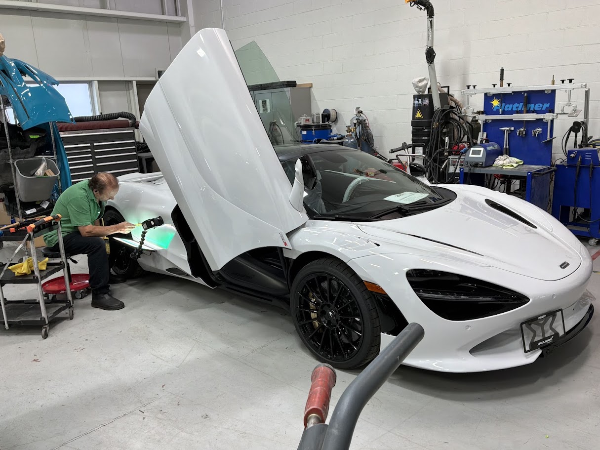 Flawless factory paint surface on a premium dealership vehicle